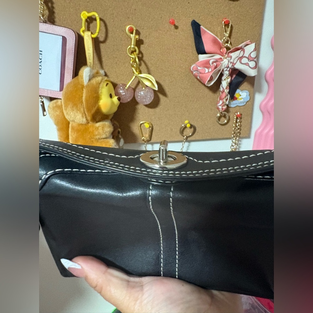 Coach turnlock wristlet